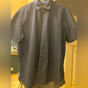 Dark, lightweight, denim , short sleeved men’s button down.